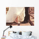 Bride and groom legs on a bridge Wall Mural