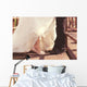 Bride and groom legs on a bridge Wall Mural