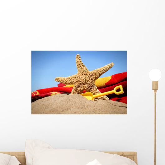 big starfish in the sand Wall Mural