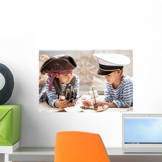 Boys play in the sea battle Wall Mural