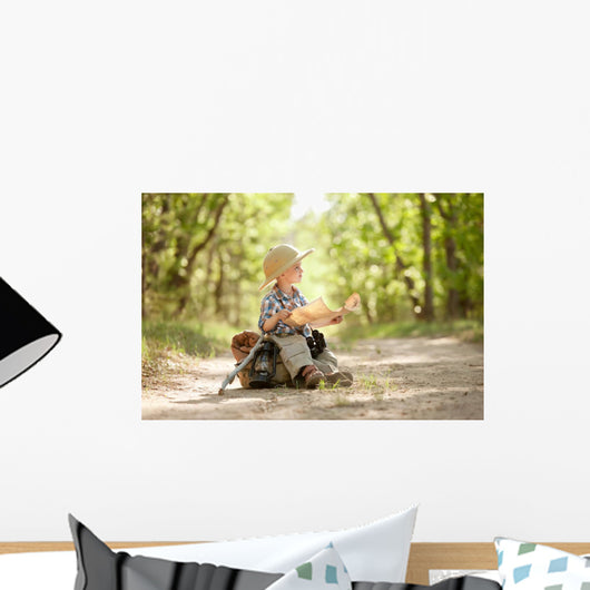 Boy traveler exploring route map Wall Mural
