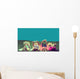 friends reading under sunshine lying on the meadow Wall Mural