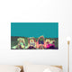 friends reading under sunshine lying on the meadow Wall Mural