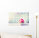 Delicious birthday cupcake on wooden table Wall Mural