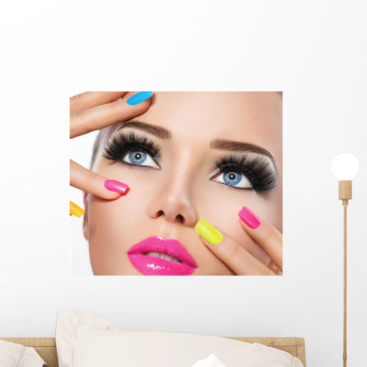 Beauty girl portrait with vivid makeup and colorful nail polish Wall Mural