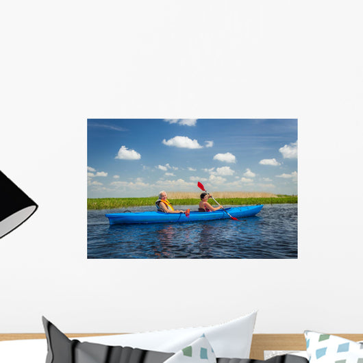 Couple kayaking on river Wall Decal