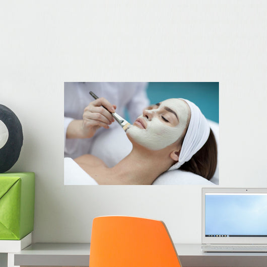 A young woman with a face pack. Wall Decal
