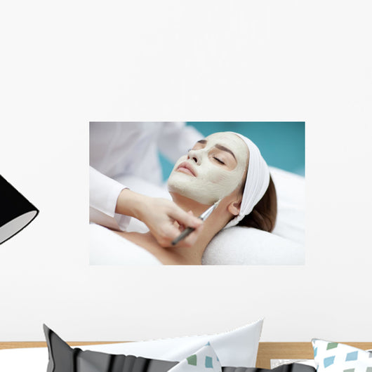 A young woman with a face pack. Wall Decal