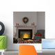 Vintage gray armchair near the fireplace with Christmas decor Wall Decal