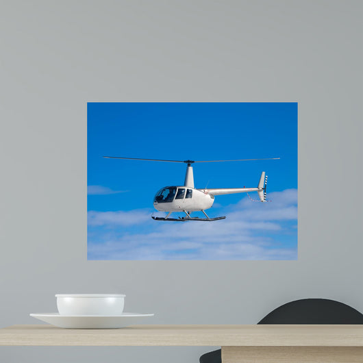 Helicopter flying in the blue sky Wall Decal