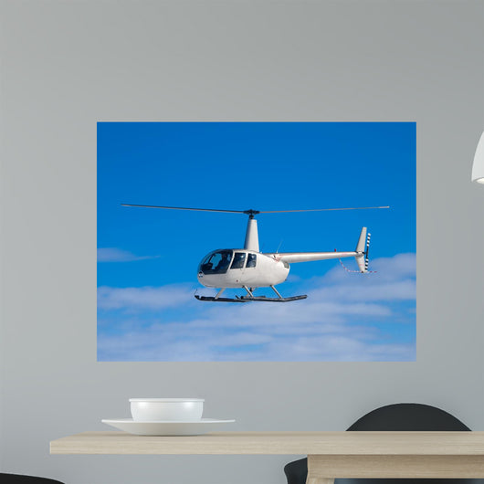 Helicopter flying in the blue sky Wall Decal