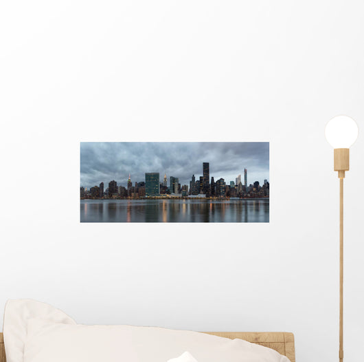 Dramatic sky over Manhattan and East River. Wall Decal