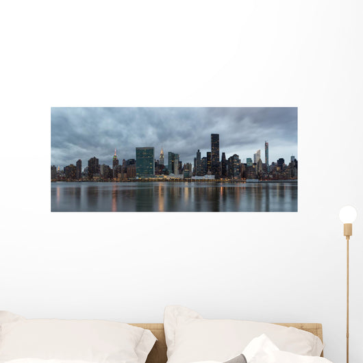 Dramatic sky over Manhattan and East River. Wall Decal