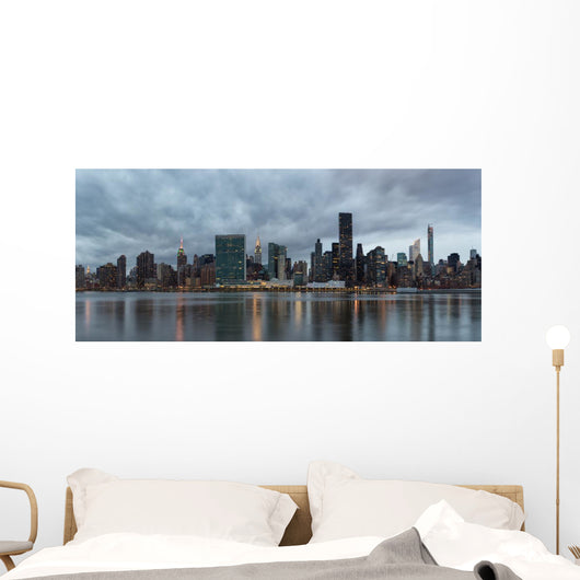 Dramatic sky over Manhattan and East River. Wall Decal