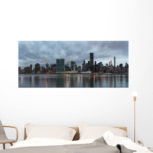 Dramatic sky over Manhattan and East River. Wall Decal