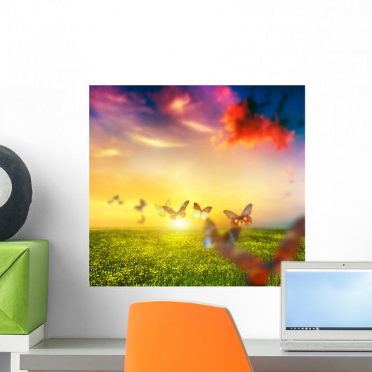 Colorful butterflies flying over spring meadow with flowers Wall Decal
