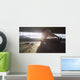 Hooded athlete stretching before or after a workout Wall Decal