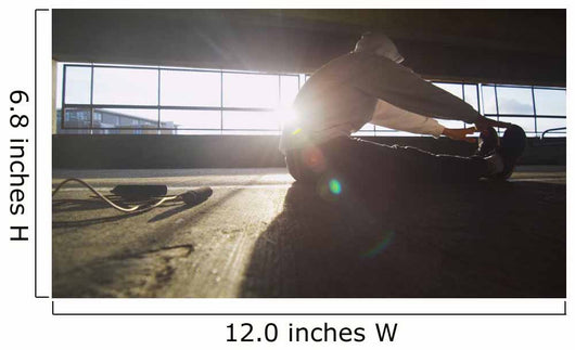Hooded athlete stretching before or after a workout Wall Decal