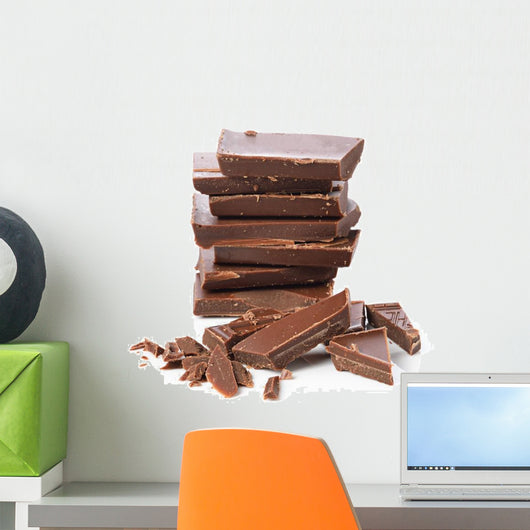 Broken chocolate bar on a white background Wall Decal