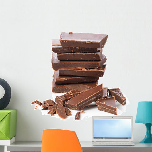Broken chocolate bar on a white background Wall Decal