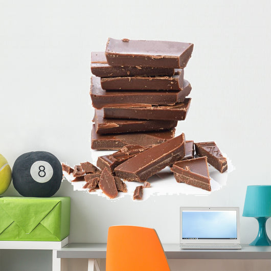 Broken chocolate bar on a white background Wall Decal