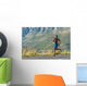 Athletic,  black male running along a road Wall Decal