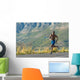Athletic,  black male running along a road Wall Decal