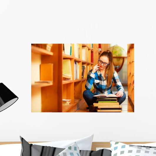 Woman student in college library Wall Decal