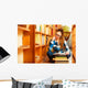Woman student in college library Wall Decal