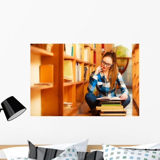 Woman student in college library Wall Decal