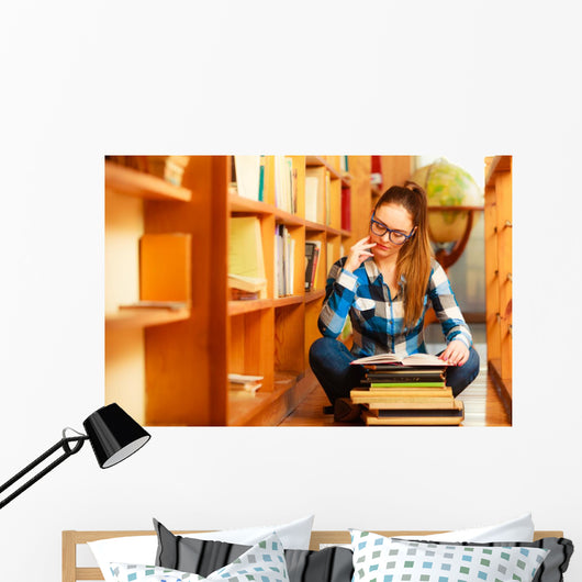 Woman student in college library Wall Decal