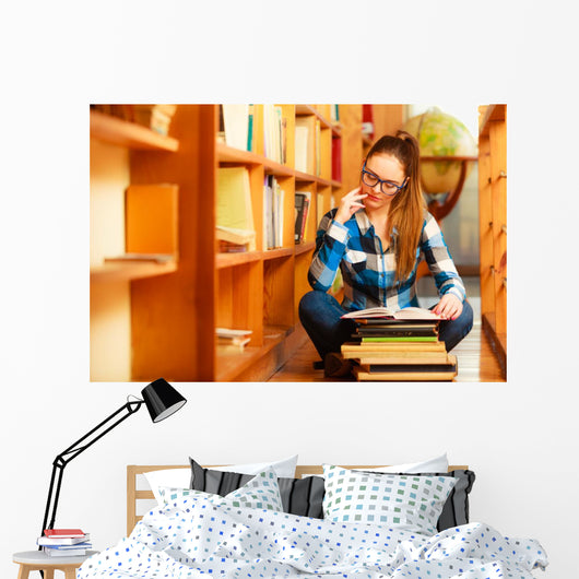 Woman student in college library Wall Decal