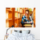 Woman student in college library Wall Decal