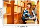 Woman student in college library Wall Decal