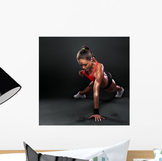 Young Woman Doing Push-Ups Wall Decal