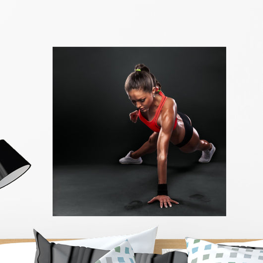Young Woman Doing Push-Ups Wall Decal