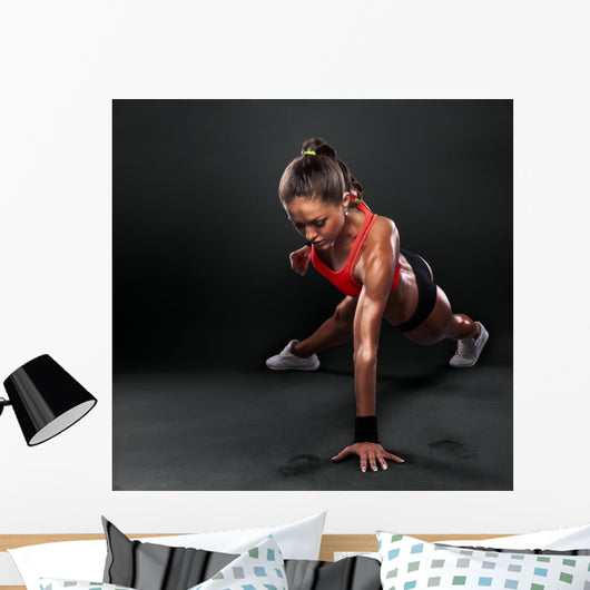 Young Woman Doing Push-Ups Wall Decal