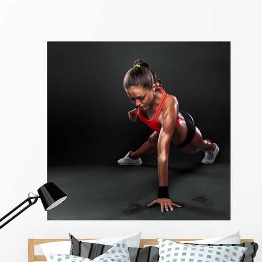 Young Woman Doing Push-Ups Wall Decal