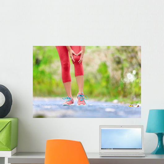 Knee Injury - sports running knee injuries on woman Wall Decal