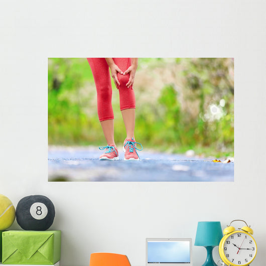 Knee Injury - sports running knee injuries on woman Wall Decal