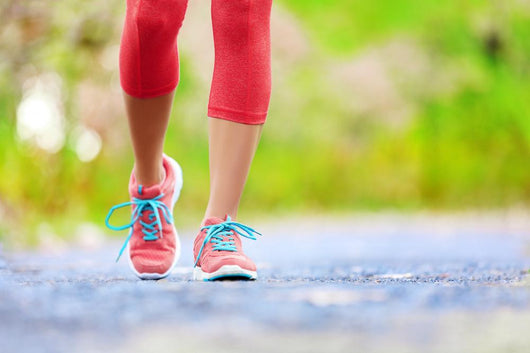 Jogging woman with athletic legs and running shoes Wall Decal