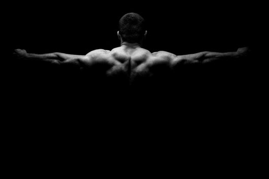 Rear view of healthy muscular young man Wall Decal