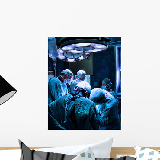 A medical team performing an operation Wall Decal