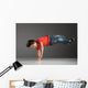 little break dancer showing his skills on grey background. Wall Decal