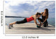 Young woman doing push-ups on a medicine ball with a coach Wall Decal