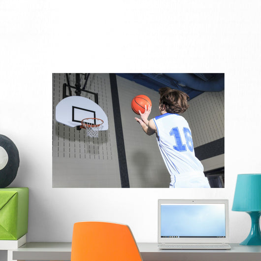 A teenager basketball player play his favorite sport Wall Decal