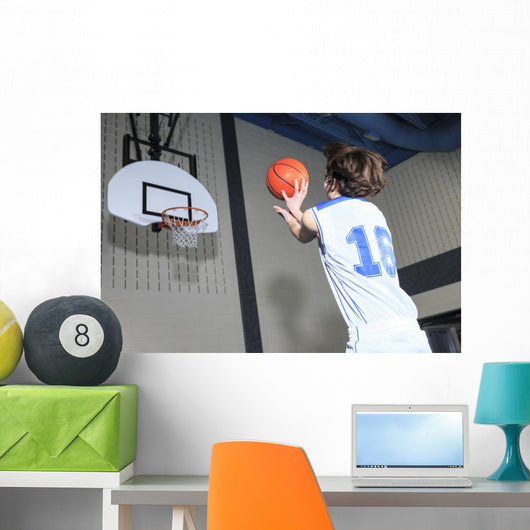 A teenager basketball player play his favorite sport Wall Decal