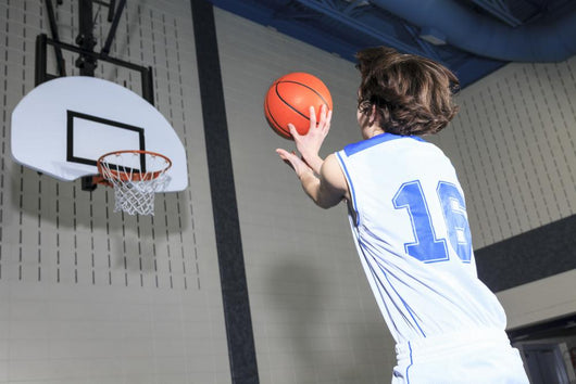 A teenager basketball player play his favorite sport Wall Decal