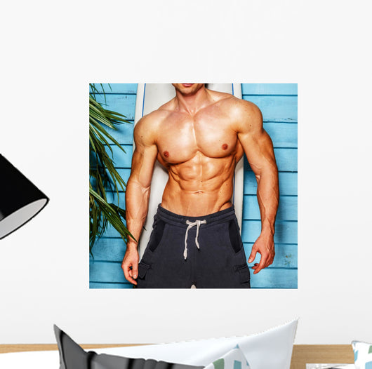 Studio shot,surfer and his swimming deck Wall Decal