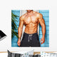 Studio shot,surfer and his swimming deck Wall Decal